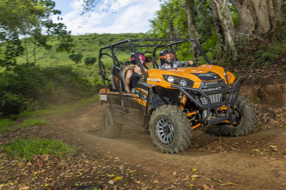 a tractor parked on a dirt road