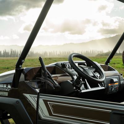 a motorcycle parked on top of a grass covered field